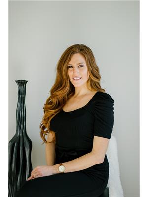Madison Holmes