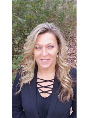 CAROL KORENIC