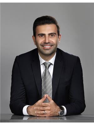 REZA KARBASSI