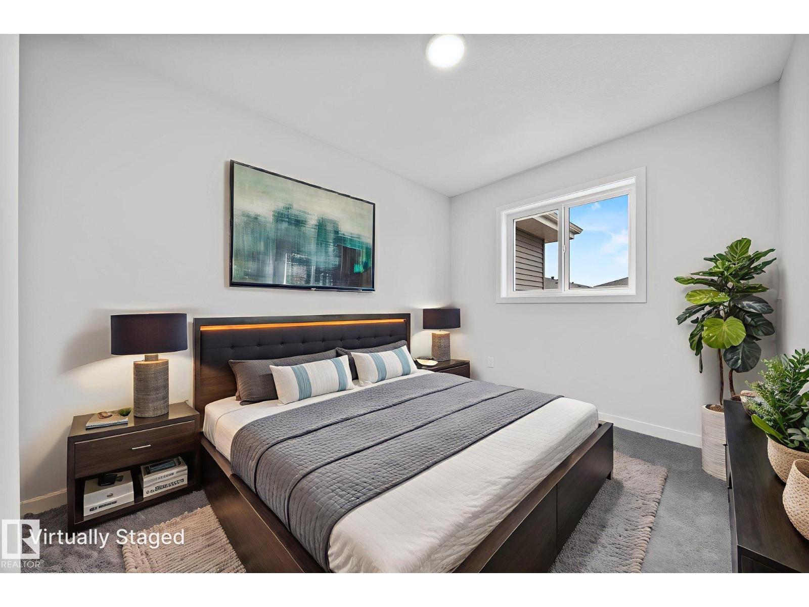 Main floor kitchen and dining at 16521 20 AV SW Glenridding Heights