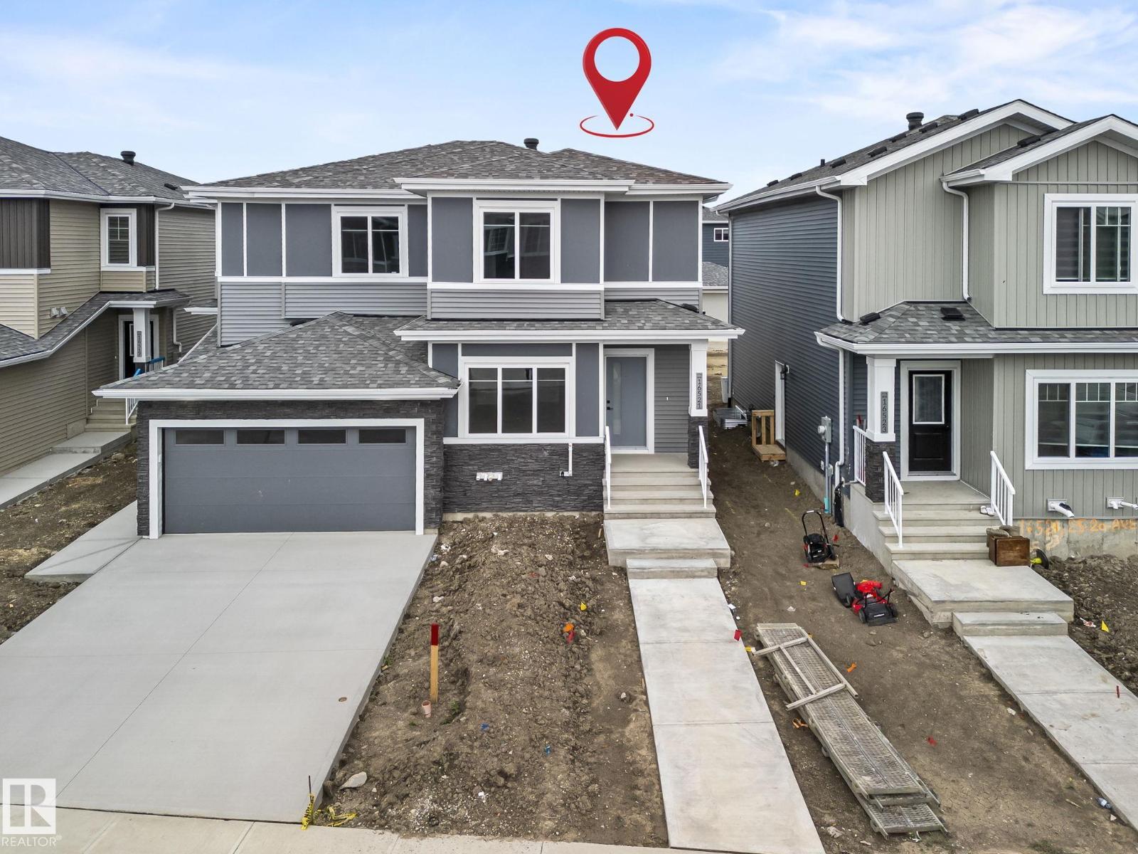 Bright living room in 16521 20 AV SW Glenridding Heights