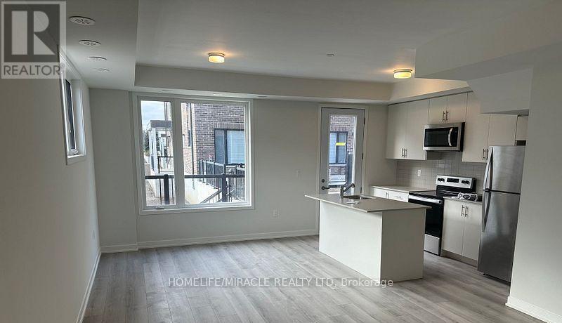 Row / Townhouse for Sale in 02 - 3415 RIDGEWAY DRIVE|Mississauga (Erin Mills), Ontario L5L0B9 3