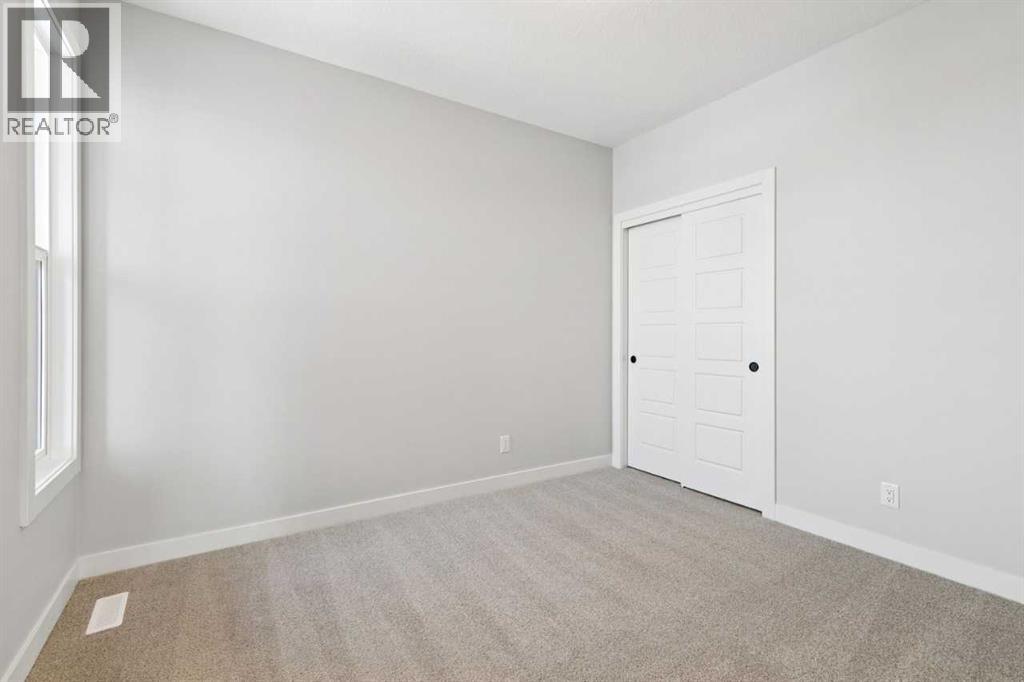 House for Sale in 94 Heartwood Villas SE|Calgary, Alberta T3S0R4 4