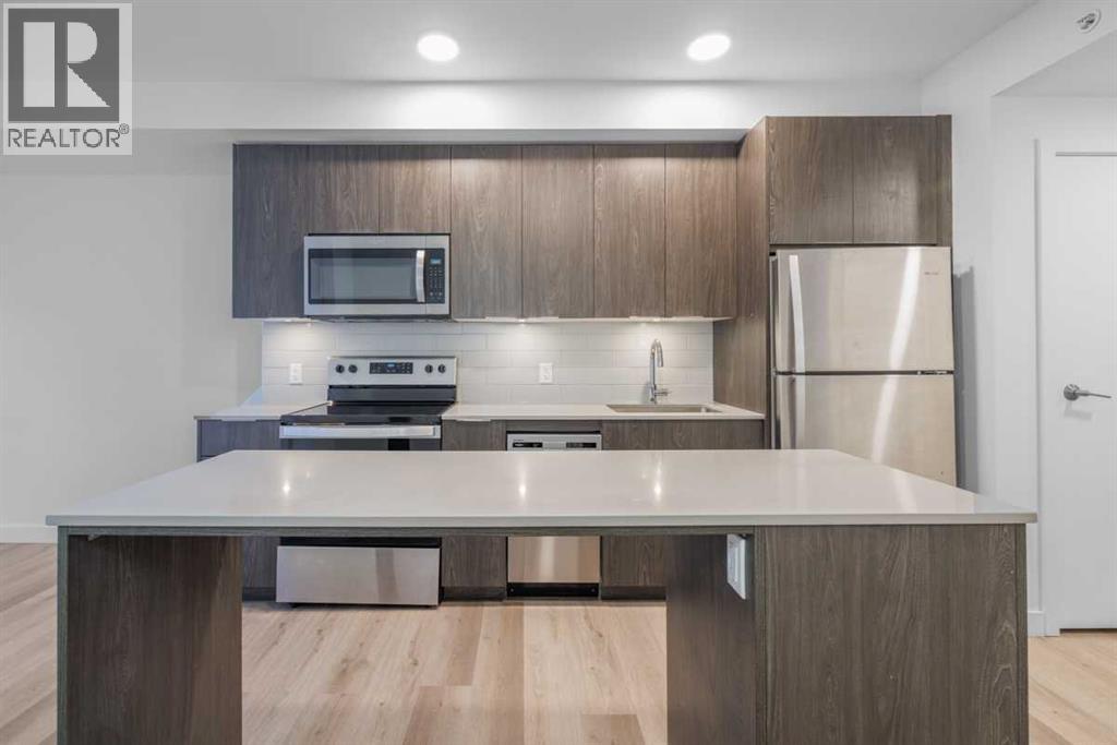 Apartment for Sale in 203, 123 4 Street NE|Calgary, Alberta T2E8K3 5