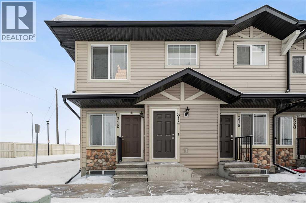 Row / Townhouse for Sale in 312 Saddlebrook Point NE|Calgary, Alberta T3H3C7