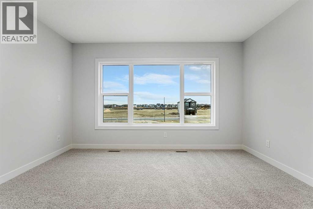 House for Sale in 56 Creekstone Grove SW|Calgary, Alberta T2X5W2 4