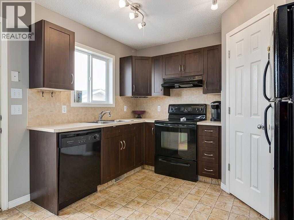 House for Sale in 50 Bridlecrest Gardens SW|Calgary, Alberta T2Y4Y4 3