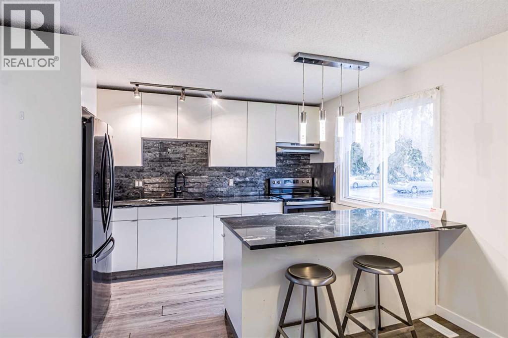 Row / Townhouse for Sale in 212 Georgian Villas NE|Calgary, Alberta t2a7c9 3