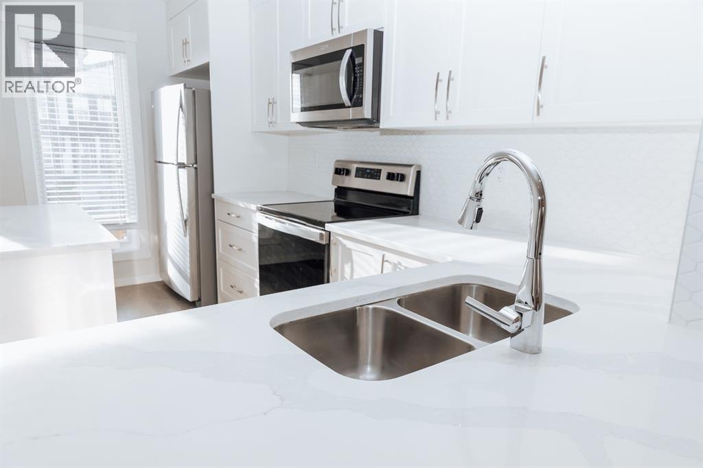 Row / Townhouse for Sale in 406, 474 Seton Circle SE|Calgary, Alberta T3M2V3 3