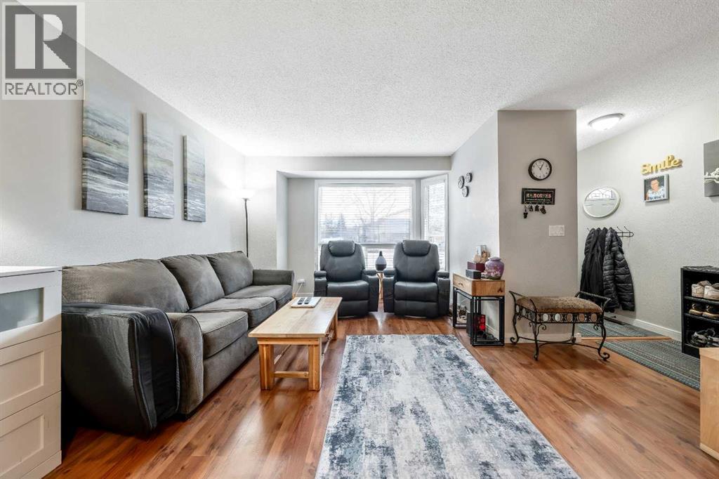 Row / Townhouse for Sale in 147, 123 Queensland Drive SE|Calgary, Alberta T2J5J4 4