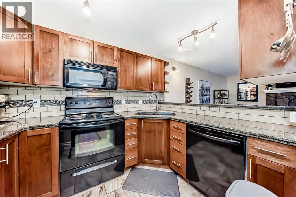 Row / Townhouse for Sale in 169, 79 Glamis Green SW|Calgary, Alberta T3E6T9 3