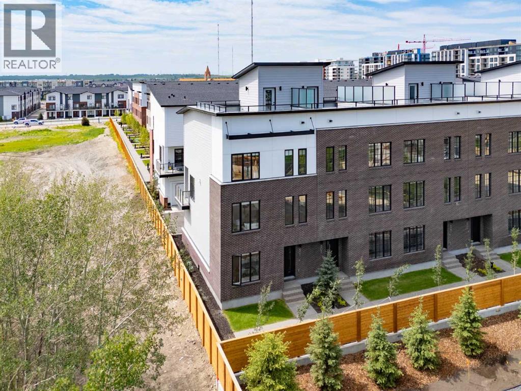 Row / Townhouse for Sale in 501, 8155 8 Avenue SW|Calgary, Alberta T3H6H9