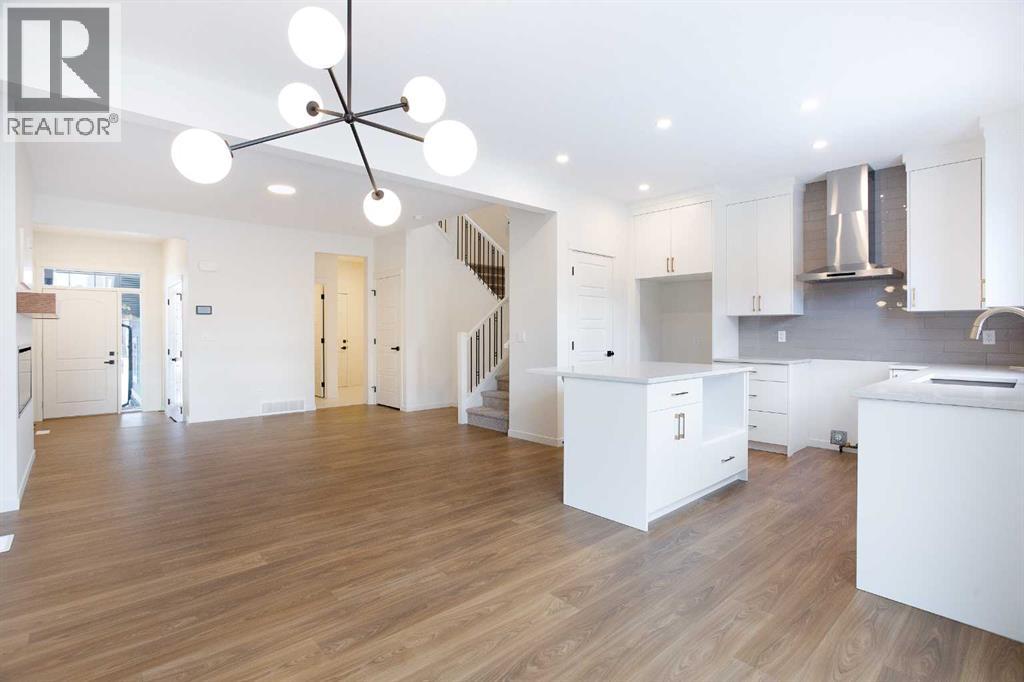 Duplex for Sale in 65 Creekside Passage SW|Calgary, Alberta T2X5V6 3