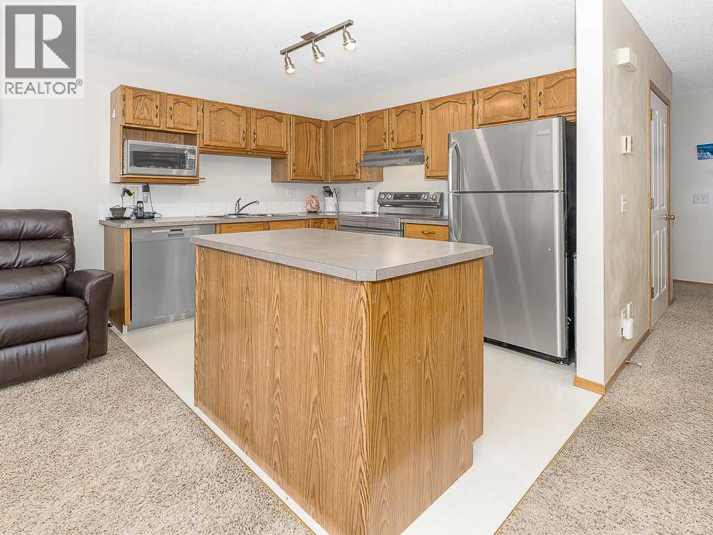 Row / Townhouse for Sale in 119 Mt Douglas Manor SE|Calgary, Alberta T2Z3C8 3