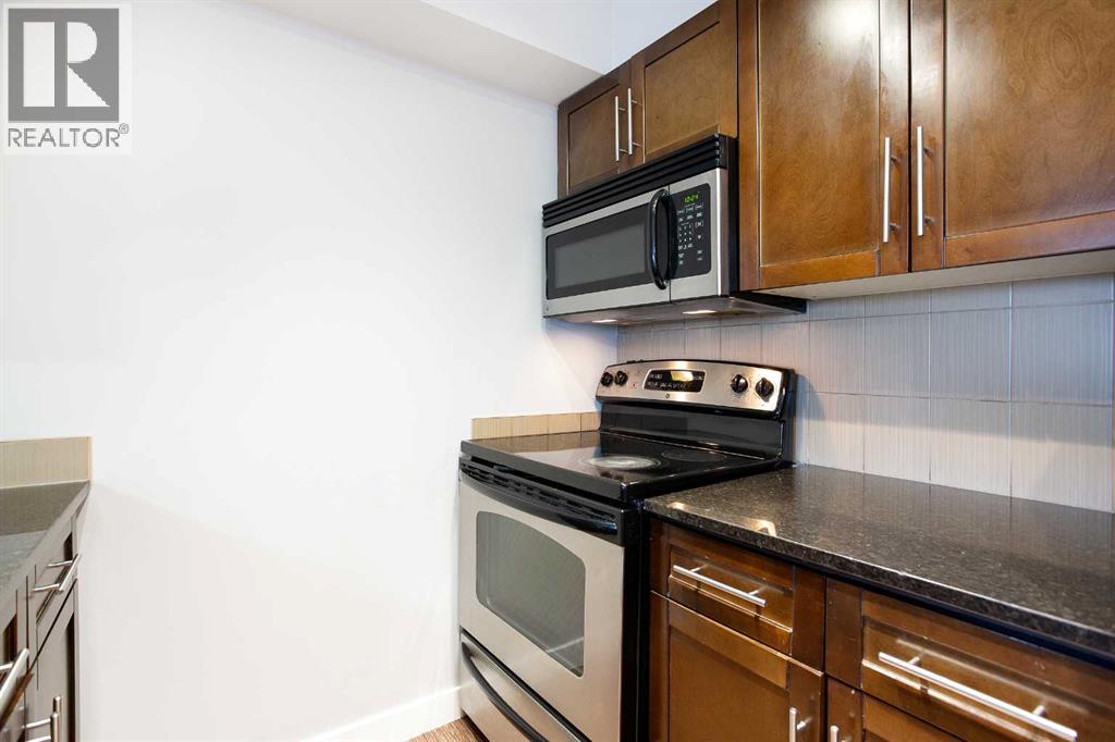 Apartment for Sale in 320, 7110 80 Avenue NE|Calgary, Alberta T3J0N4 5