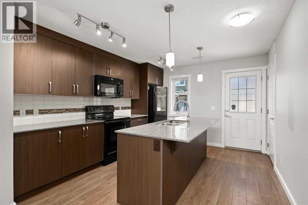 Row / Townhouse for Sale in 509 Auburn Bay Circle SE|Calgary, Alberta T3M2A2 2