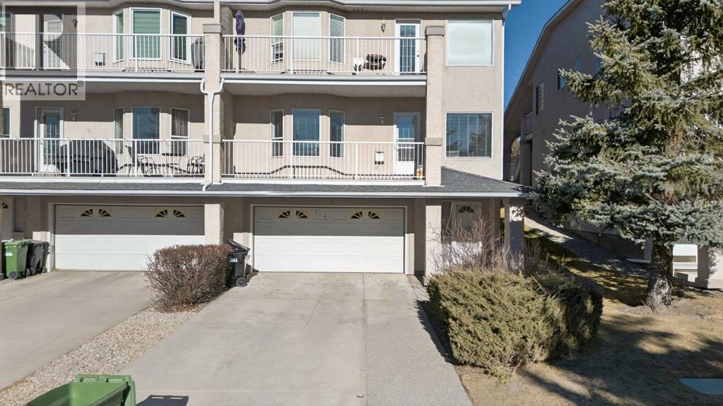 Row / Townhouse for Sale in 320 Sierra Morena Green SW|Calgary, Alberta T3H3H8