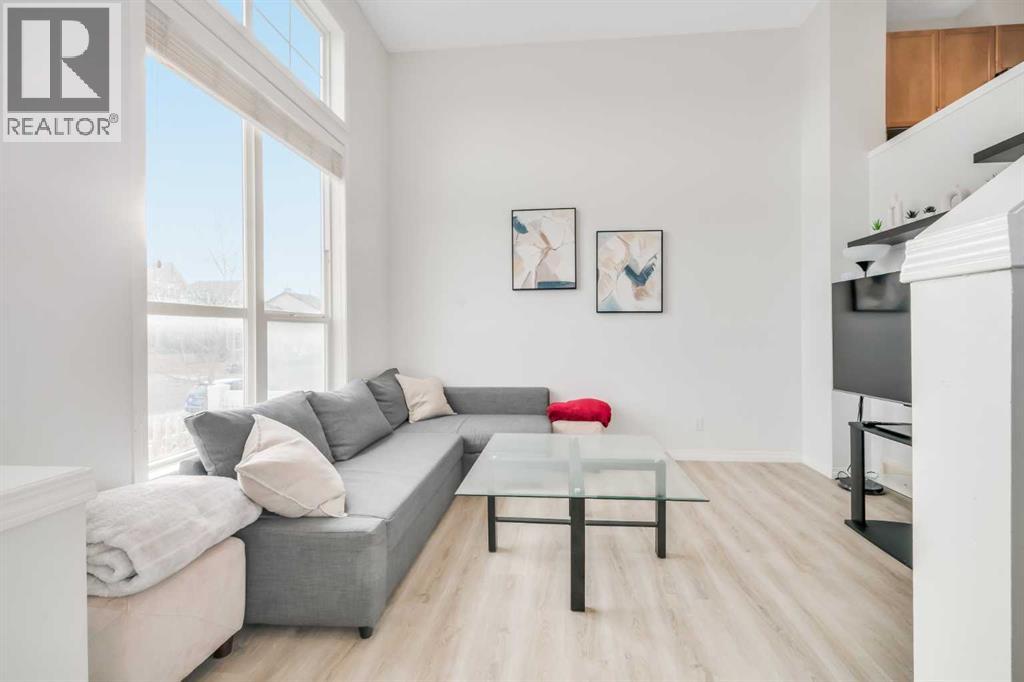 Row / Townhouse for Sale in 997 New Brighton Gardens SE|Calgary, Alberta T2Z0A2