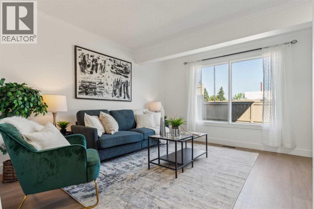 Row / Townhouse for Sale in 21, 1055 72 Avenue NW|Calgary, Alberta T2K5S4