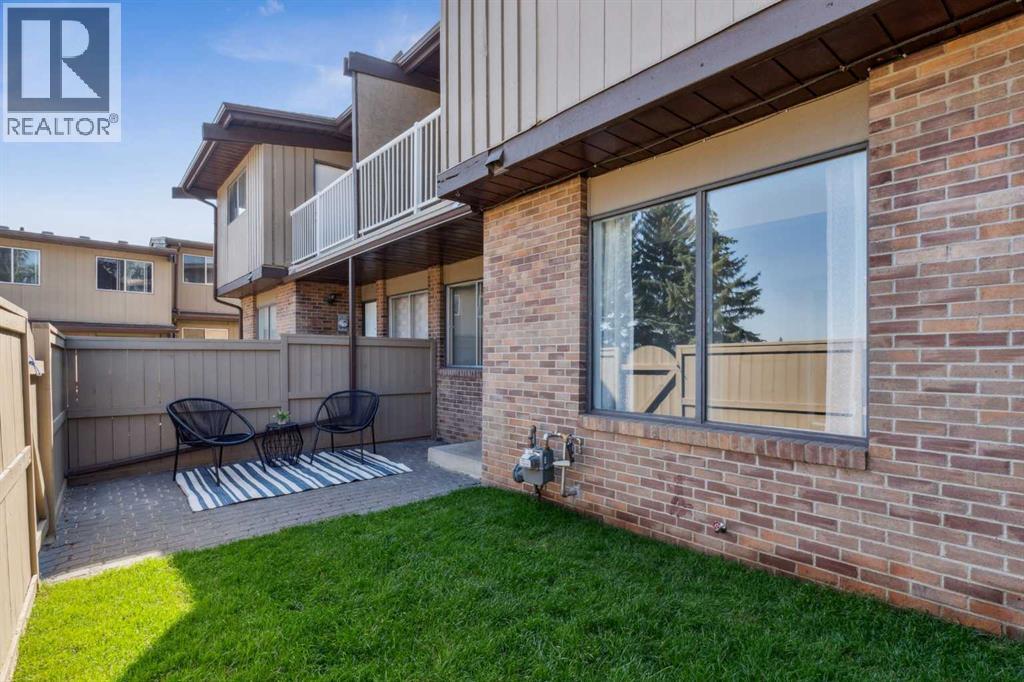Row / Townhouse for Sale in 21, 1055 72 Avenue NW|Calgary, Alberta T2K5S4 2