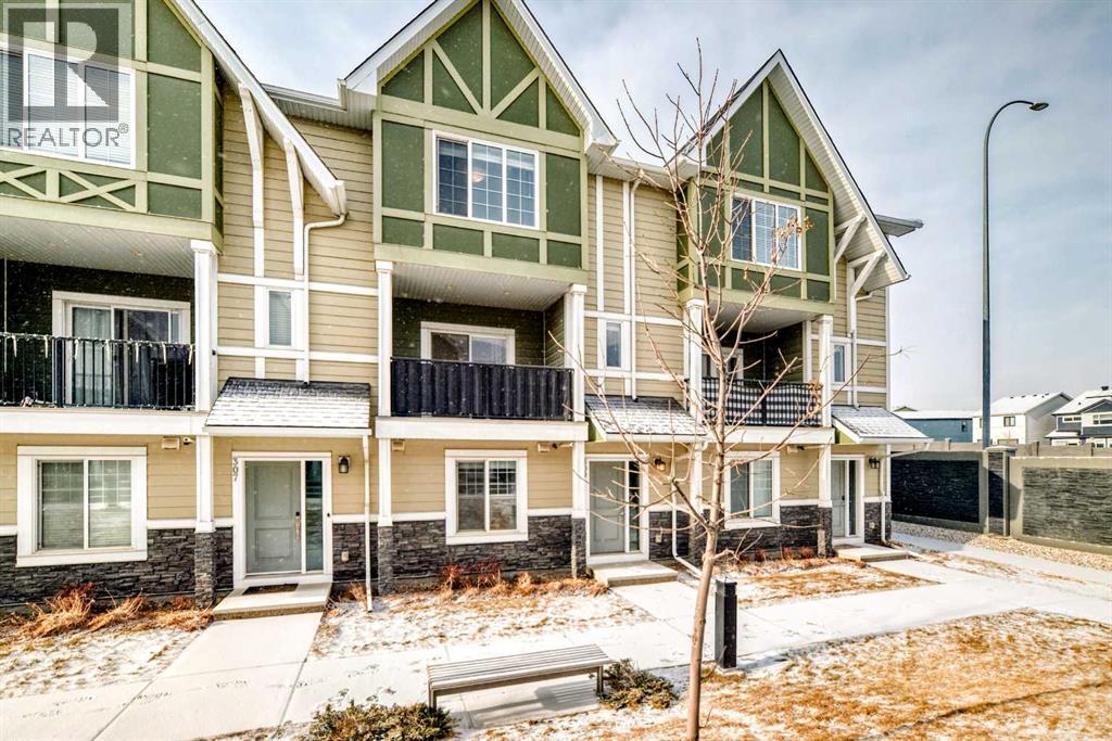 Row / Townhouse for Sale in 309 Nolanlake Villas NW|Calgary, Alberta T3R0Z7