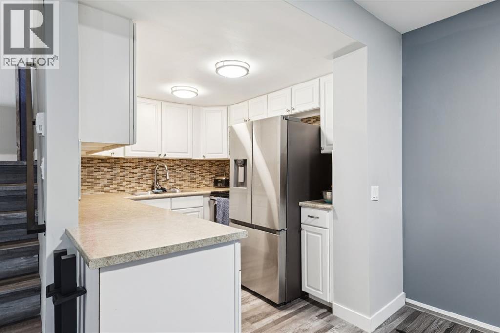 Row / Townhouse for Sale in 1001, 13104 Elbow Drive SW|Calgary, Alberta T2W2P2 4