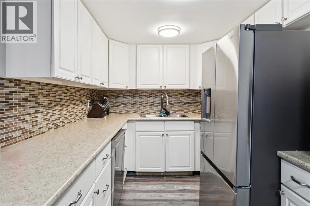 Row / Townhouse for Sale in 1001, 13104 Elbow Drive SW|Calgary, Alberta T2W2P2 5