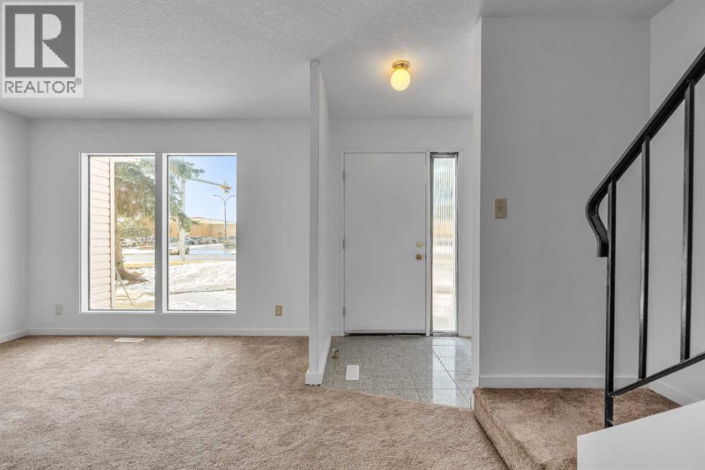 Row / Townhouse for Sale in 318 Marlborough Way NE|Calgary, Alberta T2A6R9 2