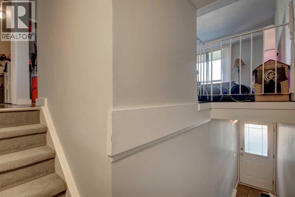 Row / Townhouse for Sale in 602, 2200 Woodview Drive SW|Calgary, Alberta T2W3N6 4