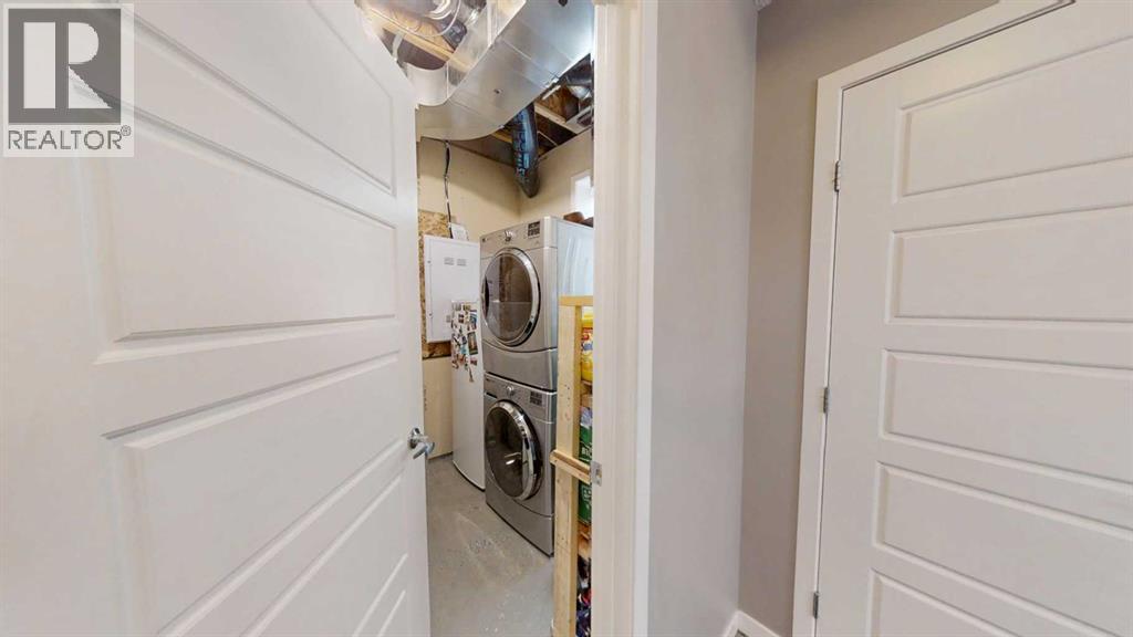 Row / Townhouse for Sale in 165 Panatella Square NW|Calgary, Alberta T3K0Z4 5