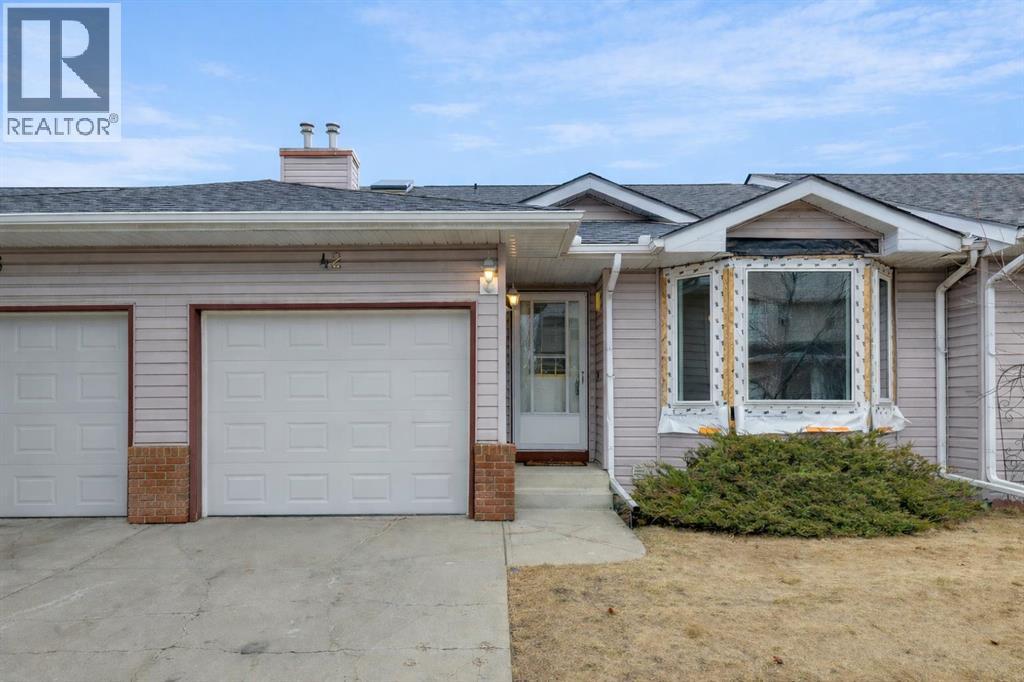 Row / Townhouse for Sale in 42 Harvest Oak Circle NE|Calgary, Alberta T3K4S6