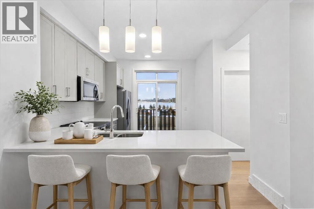 Row / Townhouse for Sale in 206, 437 Alpine Avenue SW|Calgary, Alberta T2Y0Z8