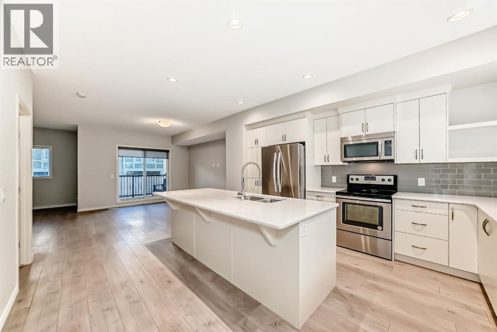 Row / Townhouse for Sale in 409 NOLANLAKE Villas NW|Calgary, Alberta T3R0Z7 5