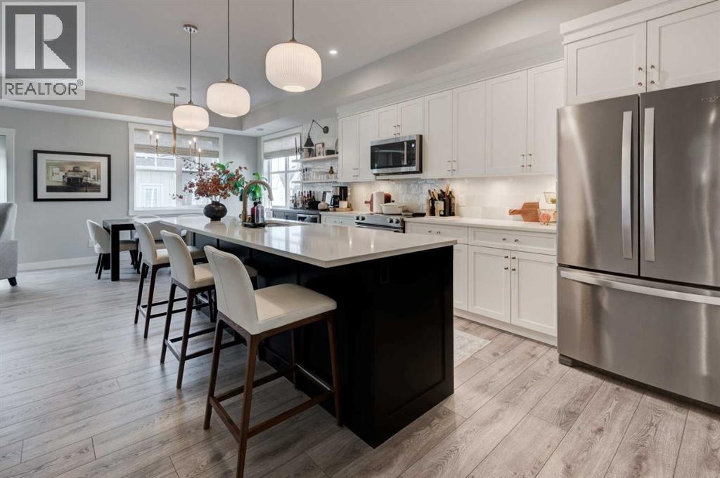 Row / Townhouse for Sale in 405 Cranbrook Walk SE|Calgary, Alberta T3M2V5 2