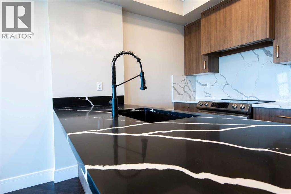 Apartment for Sale in 414, 370 Dieppe Drive SW|Calgary, Alberta T3E7L4 3