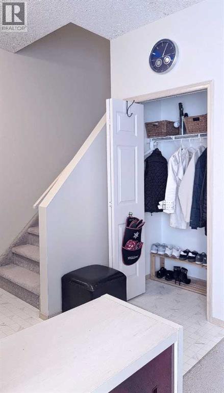 Row / Townhouse for Sale in 12 Shawbrooke Court SW|Calgary, Alberta T2Y3G2 5