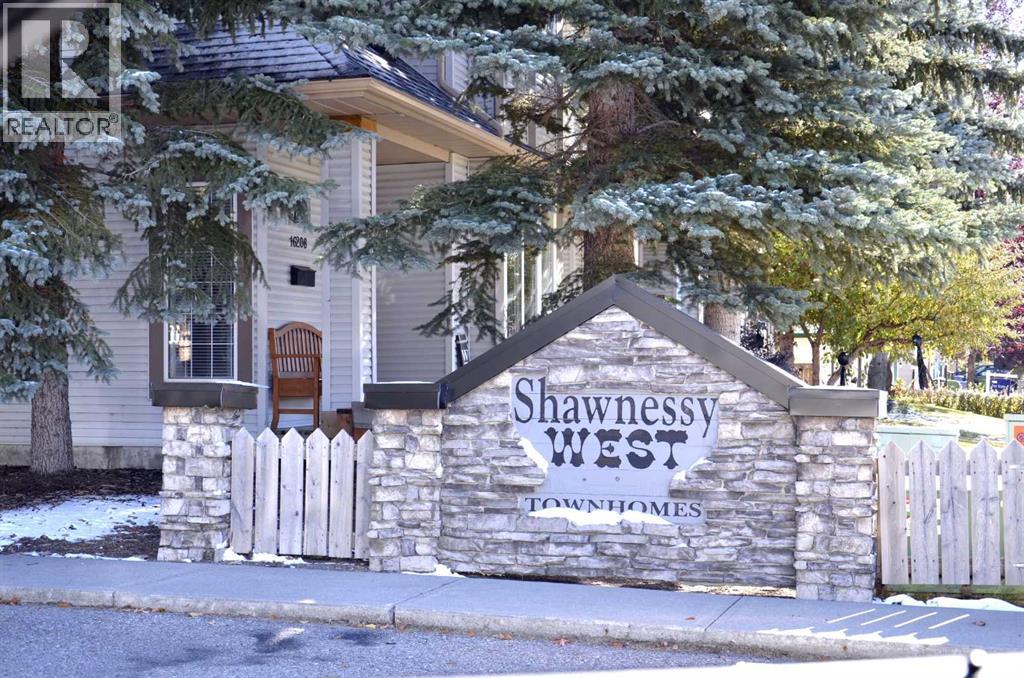 Row / Townhouse for Sale in 12 Shawbrooke Court SW|Calgary, Alberta T2Y3G2 2