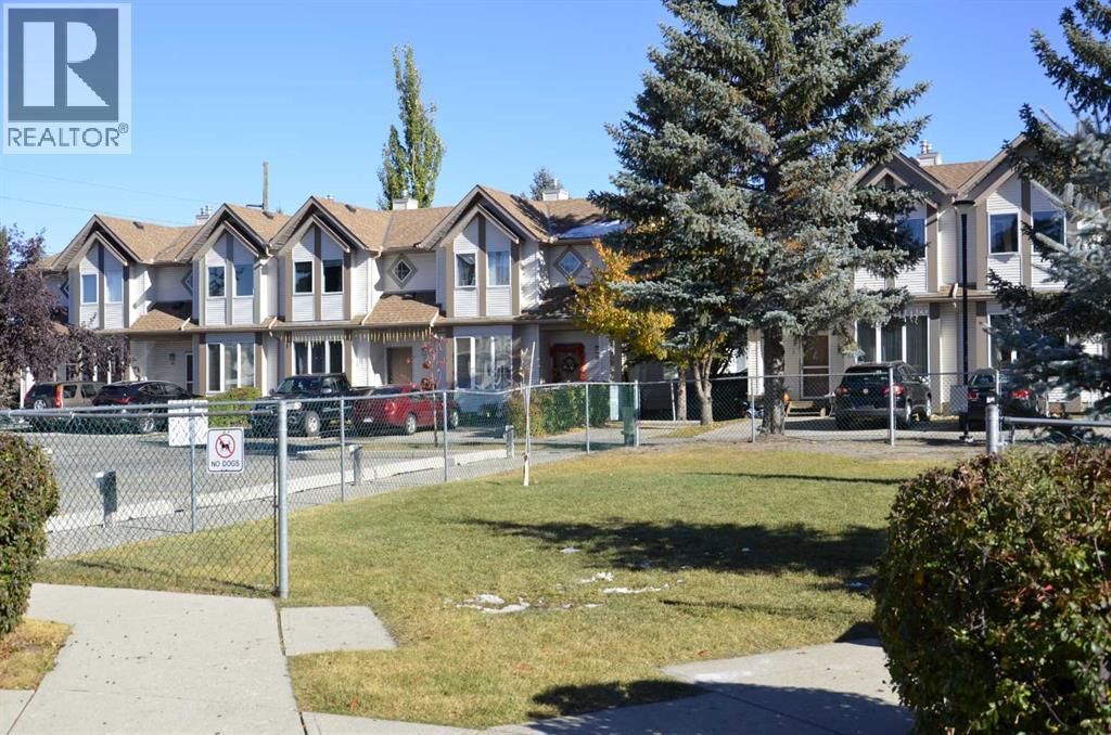 Row / Townhouse for Sale in 12 Shawbrooke Court SW|Calgary, Alberta T2Y3G2 3