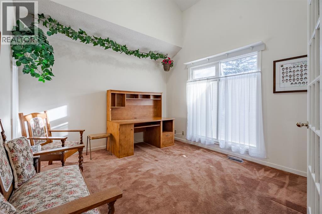 Duplex for Sale in 9, 275 Woodridge Drive SW|Calgary, Alberta T2W3S2 4