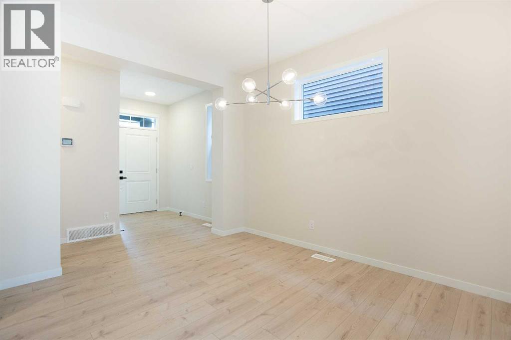 Duplex for Sale in 53 Creekside Passage SW|Calgary, Alberta T2X5V6 3