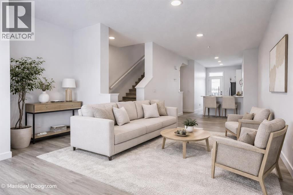 Row / Townhouse for Sale in 202, 437 Alpine Avenue SW|Calgary, Alberta T2Y0Z8