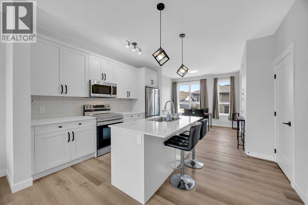 Row / Townhouse for Sale in 32 Silverton Glen Green SW|Calgary, Alberta T2X5B8 3