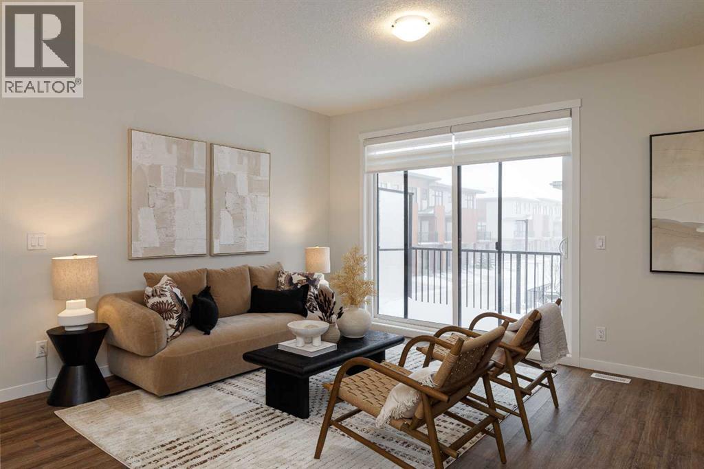 Row / Townhouse for Sale in 706, 30 Creekside Villas SW|Calgary, Alberta T1T1Z1 2