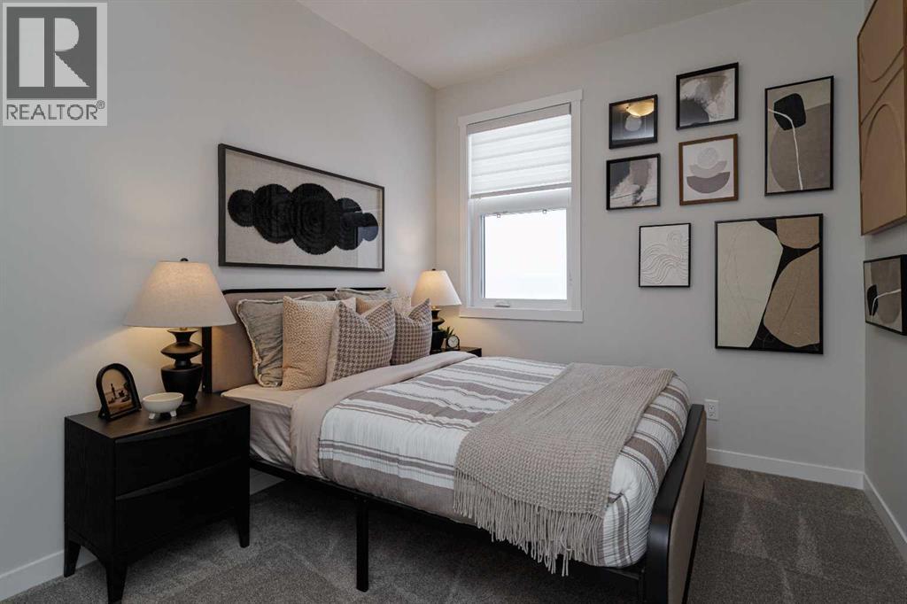 Row / Townhouse for Sale in 706, 30 Creekside Villas SW|Calgary, Alberta T1T1Z1 4