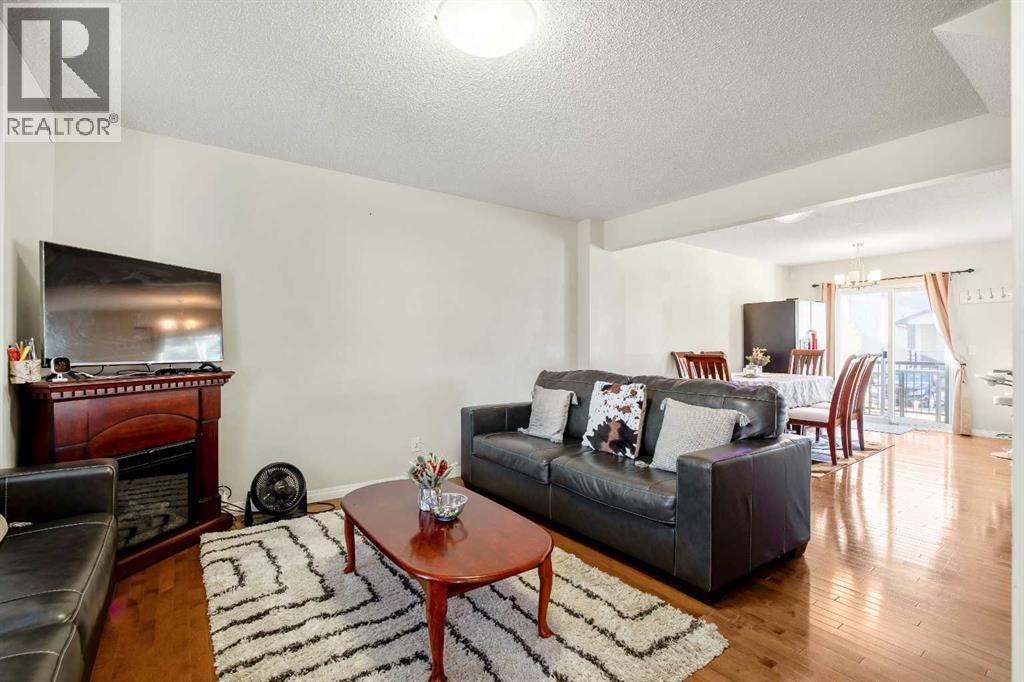 Row / Townhouse for Sale in 8339 Saddlebrook Drive NE|Calgary, Alberta T3J0P9 2