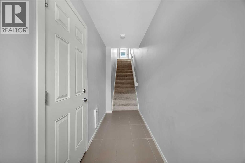 Row / Townhouse for Sale in 455 Ascot Circle SW|Calgary, Alberta T3H0X3 4