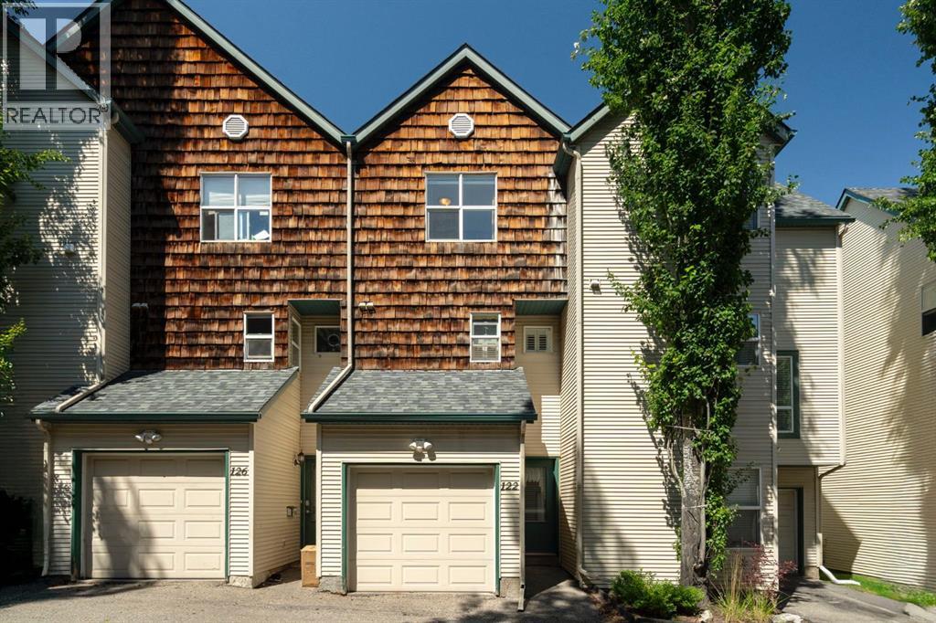 Row / Townhouse for Sale in 122 Bridlewood Lane SW|Calgary, Alberta T2Y3X8