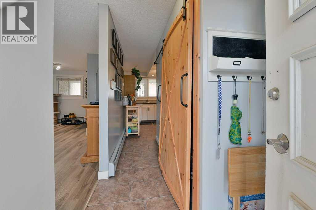 Row / Townhouse for Sale in 5, 7740 Hunterview Drive NW|Calgary, Alberta T2K5C9 2