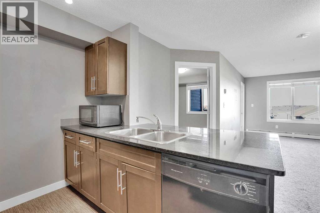 Apartment for Sale in 318, 7110 80 Avenue NE|Calgary, Alberta T3J0N4 5