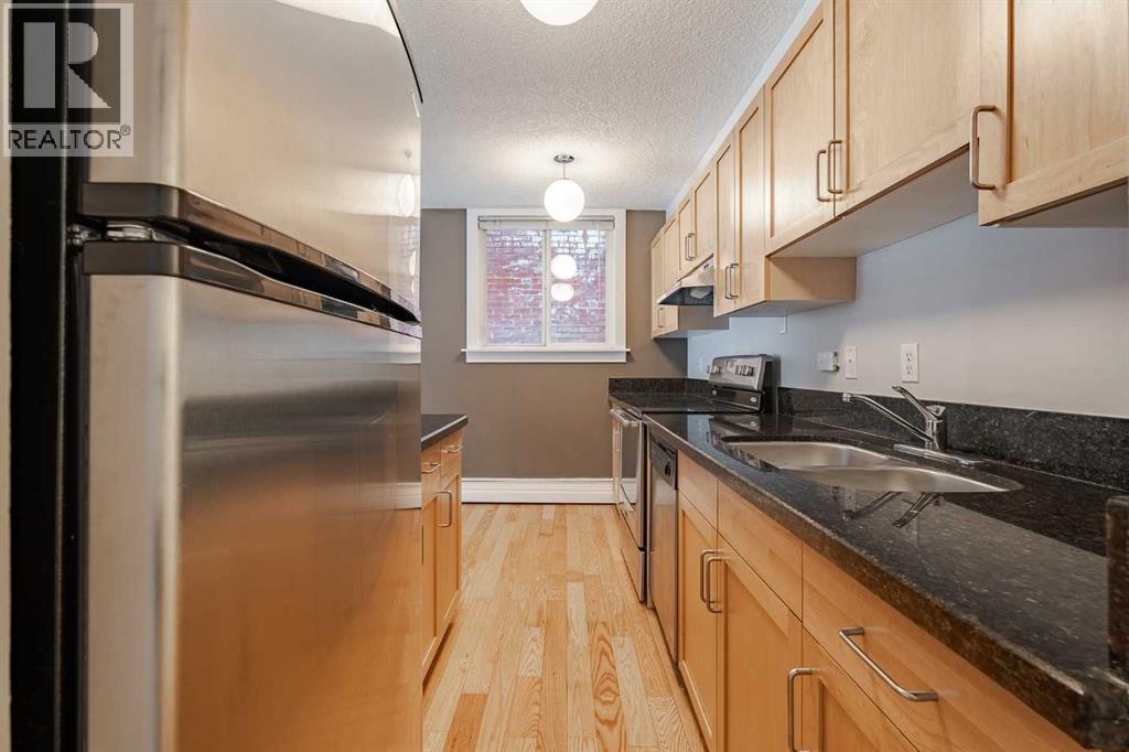 Apartment for Sale in 105, 934 2 Avenue NW|Calgary, Alberta T2N0E6 4